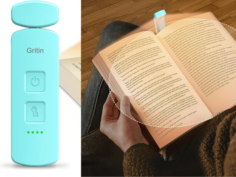 A rechargeable mini book light attached to an open book, providing soft illumination.