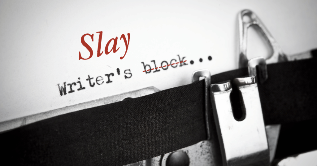 Typewriter typing the words 'Slay Writer's Block' on paper, symbolizing overcoming creative challenges.