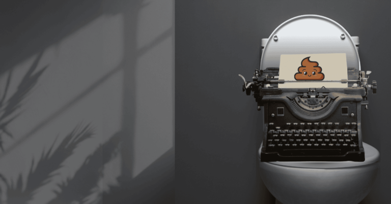 A vintage typewriter sitting on a toilet with a sheet of paper showing a cartoon poop emoji, symbolizing messy first drafts and the creative process.