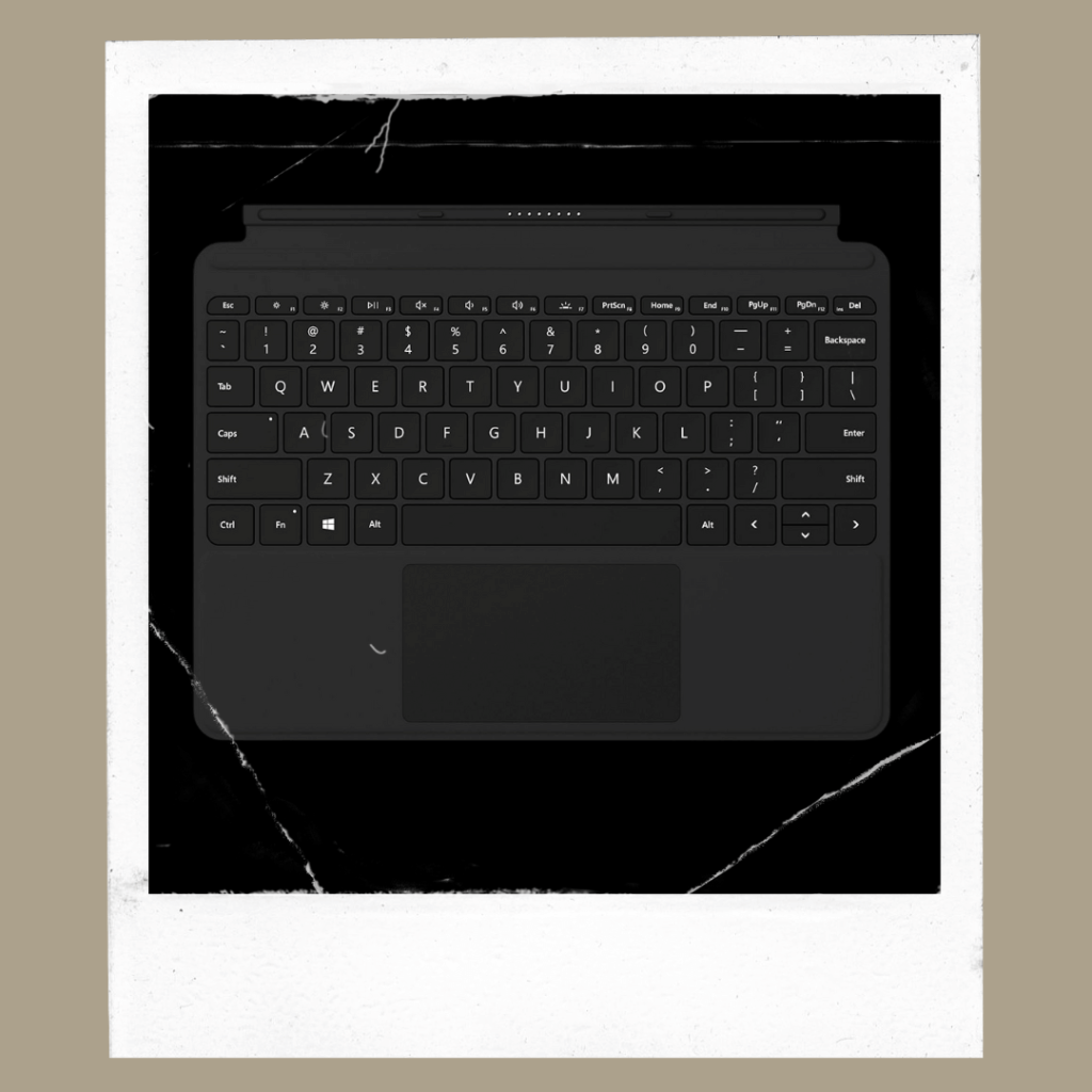 Slim black keyboard cover for compact laptop