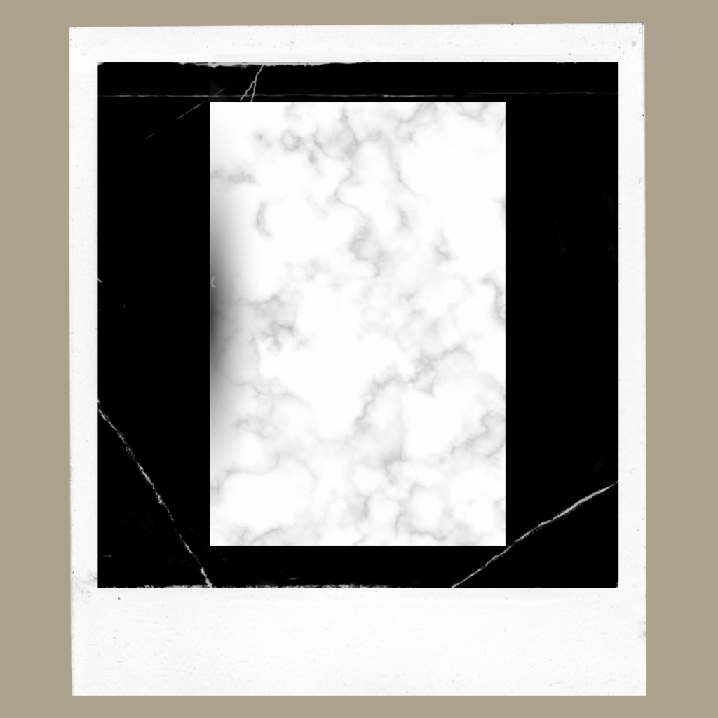 Marble-pattern notebook on a black background