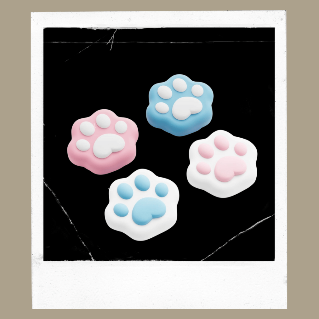 Soft pastel paw-print thumb grips for gaming controllers