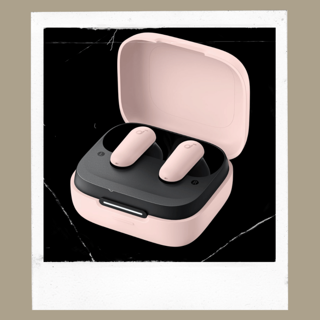 Pink earbuds inside charging case